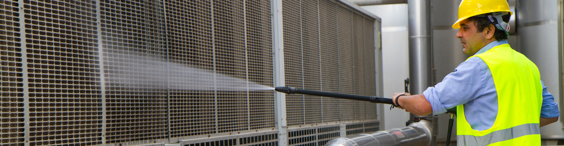 Man using a pressure washer